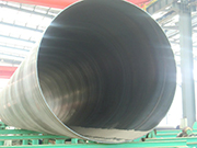 What should be done at the end of cooling large diameter steel pipes